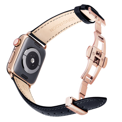 gold apple watch with midnight black leather band for women back view