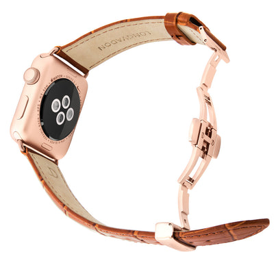 gold apple watch with whiskey brown leather band for men back view