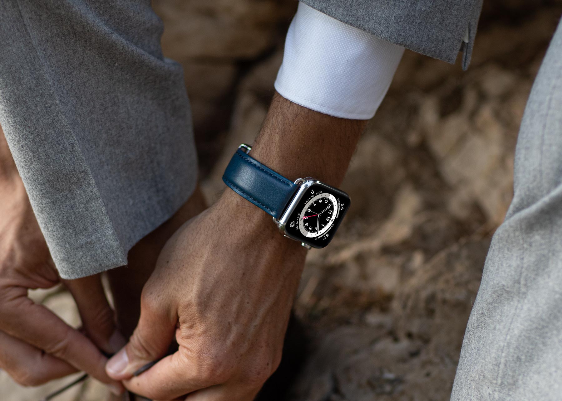 man wearing classic navy Longvadon watch band on wrist