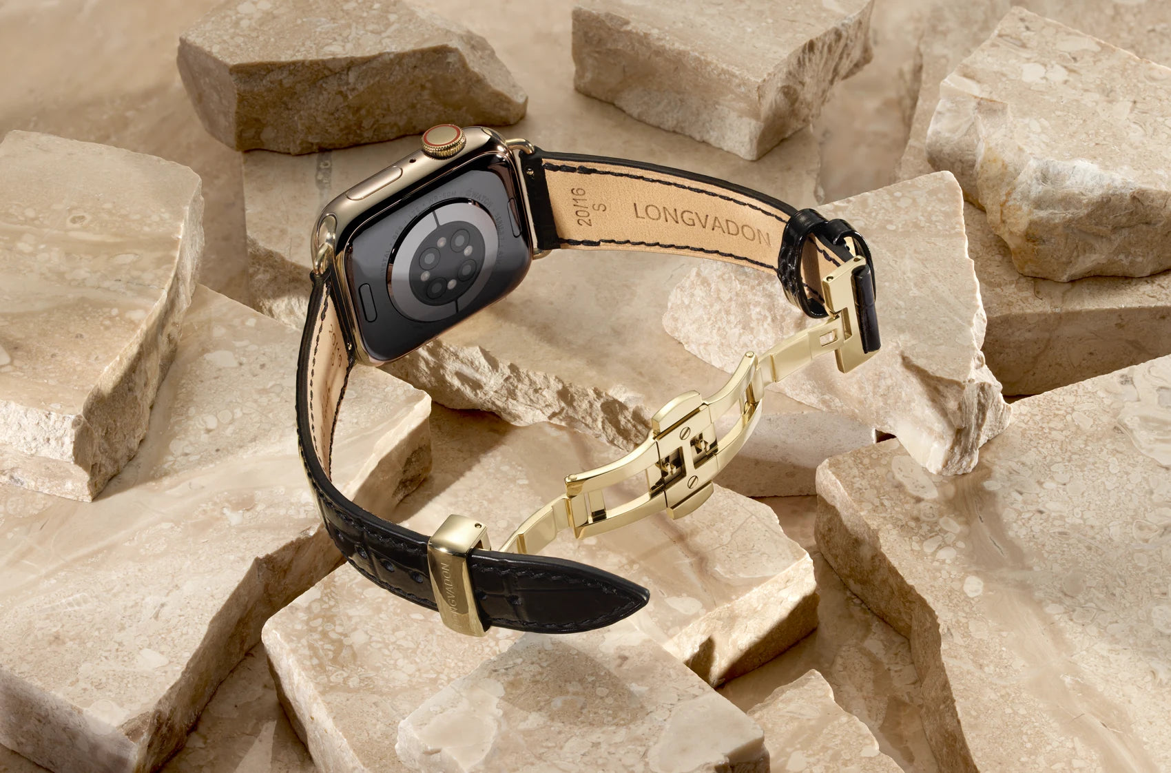 Womens opened luxury black leather apple watch band on a Series 10