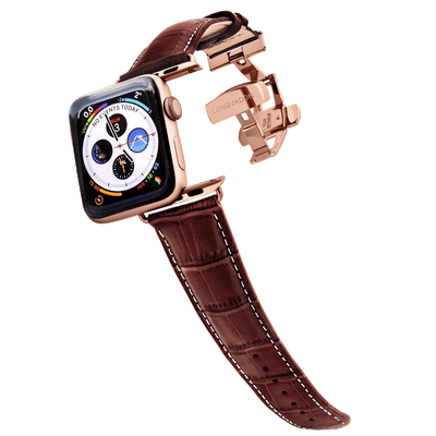 gold apple watch with mahogany brown leather band for men