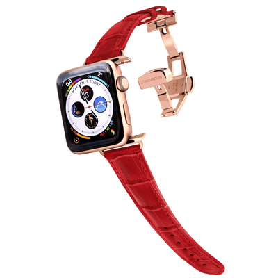 gold apple watch with crimson red leather band for women