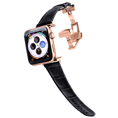 gold apple watch with midnight black leather band for women