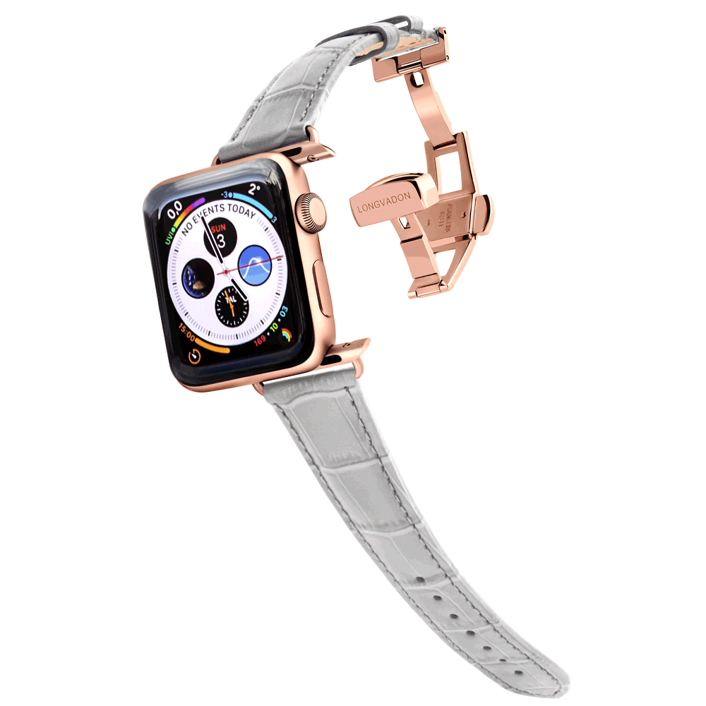gold apple watch with misty gray leather band for women