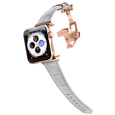 gold apple watch with misty gray leather band for women