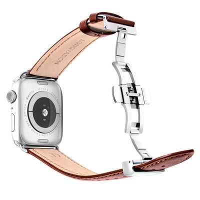 silver apple watch with mahogany brown leather band for men back view