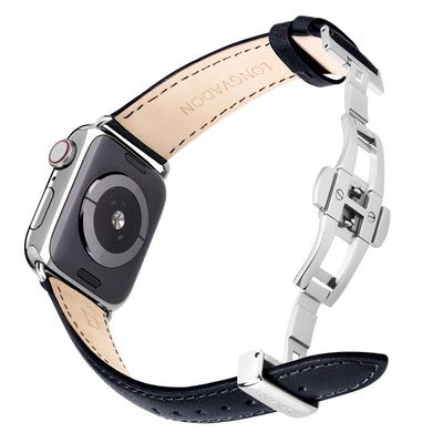 silver apple watch with black leather band for women back view