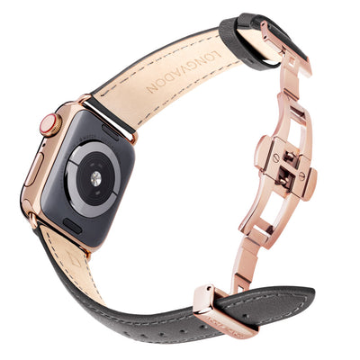 gold apple watch with dark grey leather band for women back view
