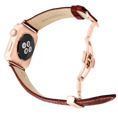 gold apple watch with mahogany brown leather band for men back view